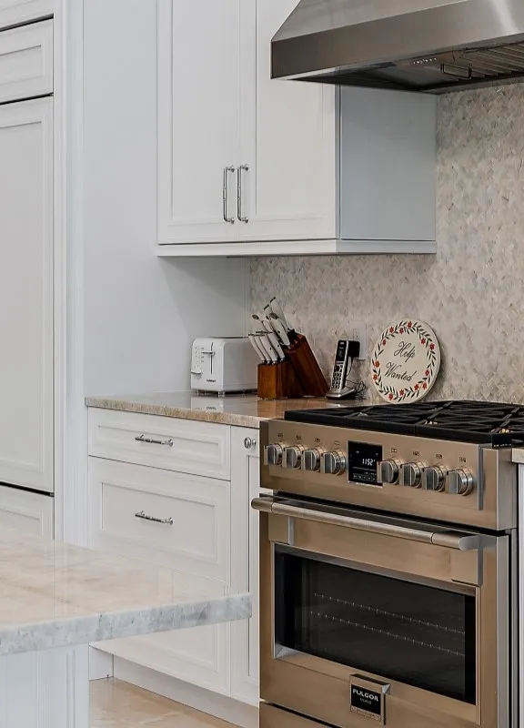 Transitional Kitchen Cabinetry Remodel with white cabinet doors, floating island and quartz counter tops